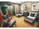 Relaxing lounge area with comfortable seating, ambient lighting, and tasteful decor at 9220 San Jose Blvd, Howey In The Hills, FL 34737