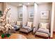 Serene spa treatment area with comfortable lounge chairs, soft lighting, and soothing decor at 9220 San Jose Blvd, Howey In The Hills, FL 34737