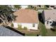 Aerial view of the home's roof and backyard garden at 9430 Se 176Th Saffold St, The Villages, FL 32162
