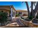 Screened-in porch leads to a nicely hardscaped backyard at 9430 Se 176Th Saffold St, The Villages, FL 32162