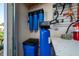 Close up of the whole-house water filtration system in the garage at 9430 Se 176Th Saffold St, The Villages, FL 32162