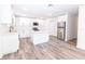 Spacious kitchen with an island, stainless steel appliances, and white cabinetry at Lot 21 Indian Estates Cr 423, Lake Panasoffkee, FL 33538