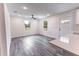 Bright living room with recessed lighting, ceiling fan, and luxury vinyl plank flooring throughout at Lot 21 Indian Estates Cr 423, Lake Panasoffkee, FL 33538