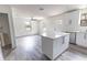 Open-concept living area with neutral walls, a ceiling fan, and bright, natural lighting at Lot 21 Indian Estates Cr 423, Lake Panasoffkee, FL 33538