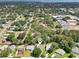 Drone shot featuring the proximity of a residence to a school and other community resources at 1011 Dundee Cir, Leesburg, FL 34788