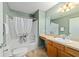 Bathroom featuring a shower-tub combo, toilet, and vanity with sink at 1014 Nash Loop, The Villages, FL 32162