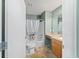 Bathroom featuring a shower-tub combo and vanity at 1014 Nash Loop, The Villages, FL 32162