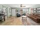 Cozy living room area with tile flooring and easy access to other rooms at 1014 Nash Loop, The Villages, FL 32162