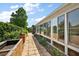 Long patio with nice landscaping at 1175 Johnston Path, The Villages, FL 32162