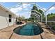 Wonderful screened pool with sun loungers and serene landscaping for ultimate relaxation at 1175 Johnston Path, The Villages, FL 32162