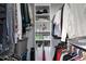 Organized closet featuring shelves, rods, and storage containers at 11868 Se 91St Cir, Summerfield, FL 34491