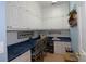 Bright office featuring custom cabinets, counter space, and natural lighting at 11868 Se 91St Cir, Summerfield, FL 34491