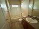 Bathroom with standard fixtures, including a tub and vanity with sink, clean and functional at 1209 Cathcart Cir, Sanford, FL 32771