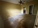 Bedroom featuring a ceiling fan, carpeted floor, and doorways leading to other rooms at 1209 Cathcart Cir, Sanford, FL 32771