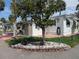 This home's exterior features a carport, shed, and attractive landscaping at 124A Shady Ln, Eustis, FL 32726