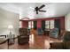 This cozy living room features hardwood floors and comfortable seating at 124A Shady Ln, Eustis, FL 32726