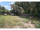 Large backyard perfect for activities, including a shed at 13137 Kansas Ave, Astatula, FL 34705