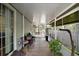 Spacious screened-in porch with room to sit and enjoy nature at 13137 Kansas Ave, Astatula, FL 34705