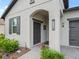 Close up of front door showing house number and landscaping at 17108 Se 111Th Terrace Rd, Summerfield, FL 34491