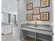 Hallway includes a desk area with a granite countertop and puppy pictures at 17108 Se 111Th Terrace Rd, Summerfield, FL 34491