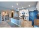 Bright kitchen with a large island, stainless steel appliances, and white cabinetry at 17108 Se 111Th Terrace Rd, Summerfield, FL 34491