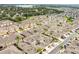 Expansive neighborhood featuring beautifully landscaped townhomes and convenient parking at 17406 Chateau Pine Way, Clermont, FL 34711