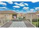 Private balcony with seating and neighborhood views, perfect for relaxation at 17406 Chateau Pine Way, Clermont, FL 34711