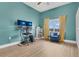 Home office with a sleek desk, dual monitors, a comfortable chair, and bright, natural light at 17406 Chateau Pine Way, Clermont, FL 34711