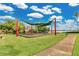 Community playground with shade structure and lush green surroundings, by the lake at 17406 Chateau Pine Way, Clermont, FL 34711