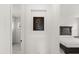 Bright bedroom featuring wood headboard, with a reading area in the same space at 17700 Sawgrass Run, Tavares, FL 32778