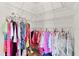 Walk-in closet with ample shelving, clothing racks, and open storage at 2077 Vickers Pl, The Villages, FL 32163
