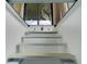 Stairwell leading to a home's basement, offering a unique blend of style and functionality at 2082 Vision Ct, The Villages, FL 32163
