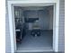 Garage featuring large storage cabinets, a sink, and ample space for parking at 2082 Vision Ct, The Villages, FL 32163