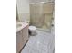 Compact bathroom with a shower, toilet, and vanity at 2105 Escobar Ave, The Villages, FL 32159