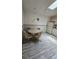 Eat-in kitchen area with a table and chairs, adjacent to the kitchen appliances at 2105 Escobar Ave, The Villages, FL 32159