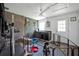 Dog grooming room featuring stainless steel sink and bathing station, indoor dog kennels and pet-friendly design at 21320 Paradise Way, Eustis, FL 32736