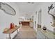 Hallway that opens to the living room with hardwood floors at 21320 Paradise Way, Eustis, FL 32736