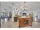 Spacious kitchen with an island, stainless appliances, and open to the rest of the home at 21320 Paradise Way, Eustis, FL 32736