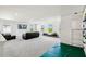 Spacious bonus room with climbing wall, padded floor, and abundant natural light at 2350 Gold Dust Dr, Clermont, FL 34715