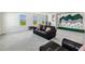 Large bonus room features a climbing wall, recreational area, and comfortable seating at 2350 Gold Dust Dr, Clermont, FL 34715