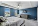 Beautiful main bedroom with large windows, neutral carpet, and recessed lighting at 2350 Gold Dust Dr, Clermont, FL 34715