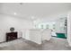 Bright upstairs landing with natural light, leading to additional living spaces at 2350 Gold Dust Dr, Clermont, FL 34715