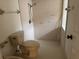 Bathroom with a toilet, walk-in shower, and a standard shower head fixture at 2450 Sweetwater Country Club Dr, Apopka, FL 32712