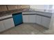 A kitchen area featuring white cabinets and a double basin stainless steel sink at 2450 Sweetwater Country Club Dr, Apopka, FL 32712