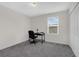 Functional bedroom space with desk, chair, and ample natural light at 2532 Autumn Stream Dr, Leesburg, FL 34748