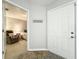 Inviting home entryway leading into a bedroom with neutral wall color at 264 Juniper Way, Tavares, FL 32778
