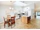 Bright, spacious kitchen with center island, skylight, and modern appliances at 264 Juniper Way, Tavares, FL 32778
