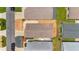 Bird's-eye view of residential neighborhood, with paved driveways, gravel landscaping and well-kept lawns at 2805 Burgos Dr, The Villages, FL 32162