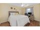Cozy bedroom with a ceiling fan and desk area at 2805 Burgos Dr, The Villages, FL 32162