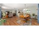 The living space showcases an open concept floor plan that flows into a dining area and kitchen at 2805 Burgos Dr, The Villages, FL 32162